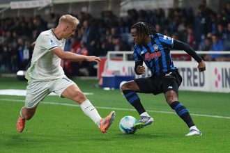 Lookman controls the ball under pressure from Gustav Isaksen. (Photo | Getty Images)